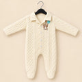Baby winter quilted footed romper in cream with teddy bear embroidery, front snap buttons and long sleeves