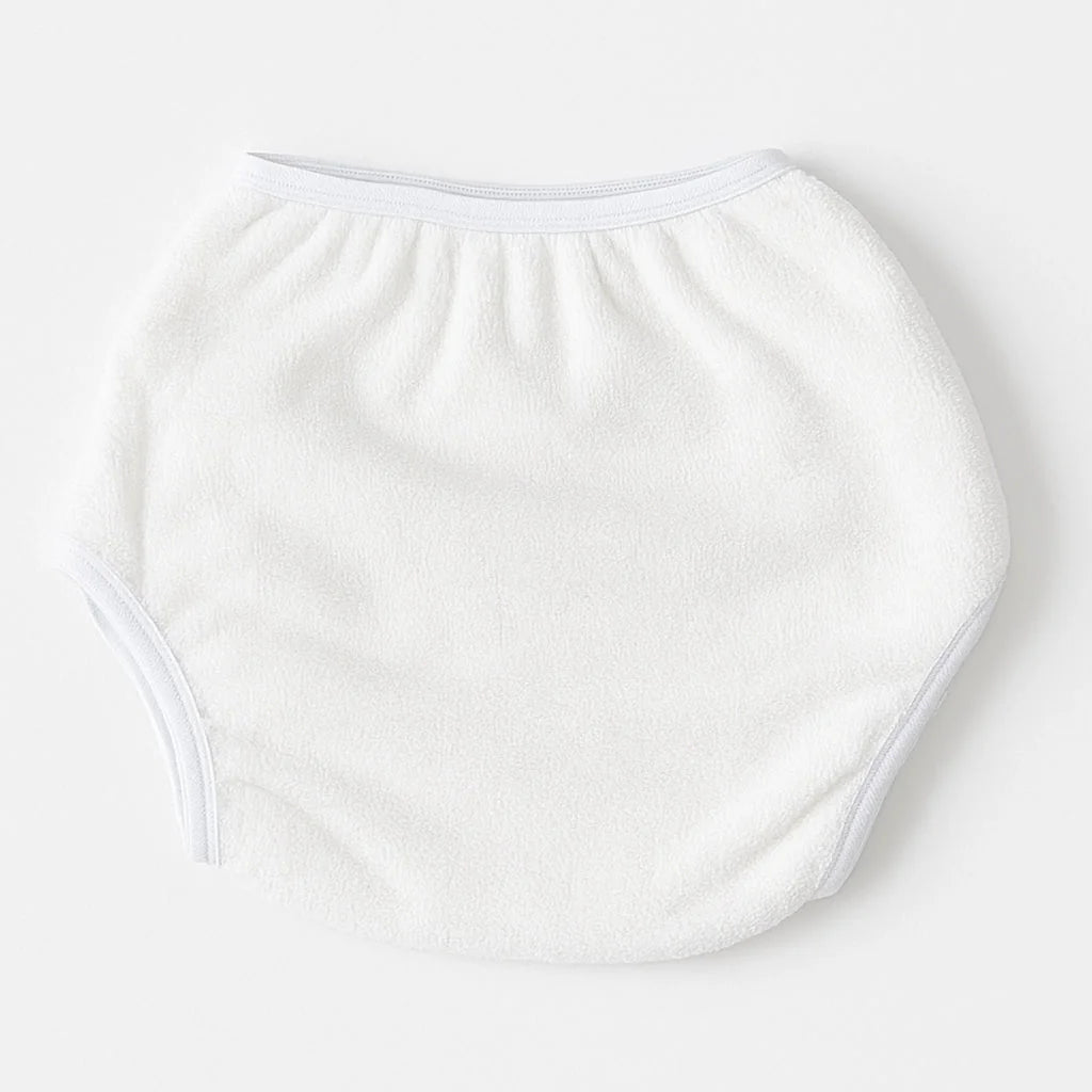 White absorbent baby training pants with soft elastic waistband and leg openings