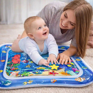 Parent and Baby Playing on Ocean Theme Water Play Mat for Tummy Time and Sensory Activity