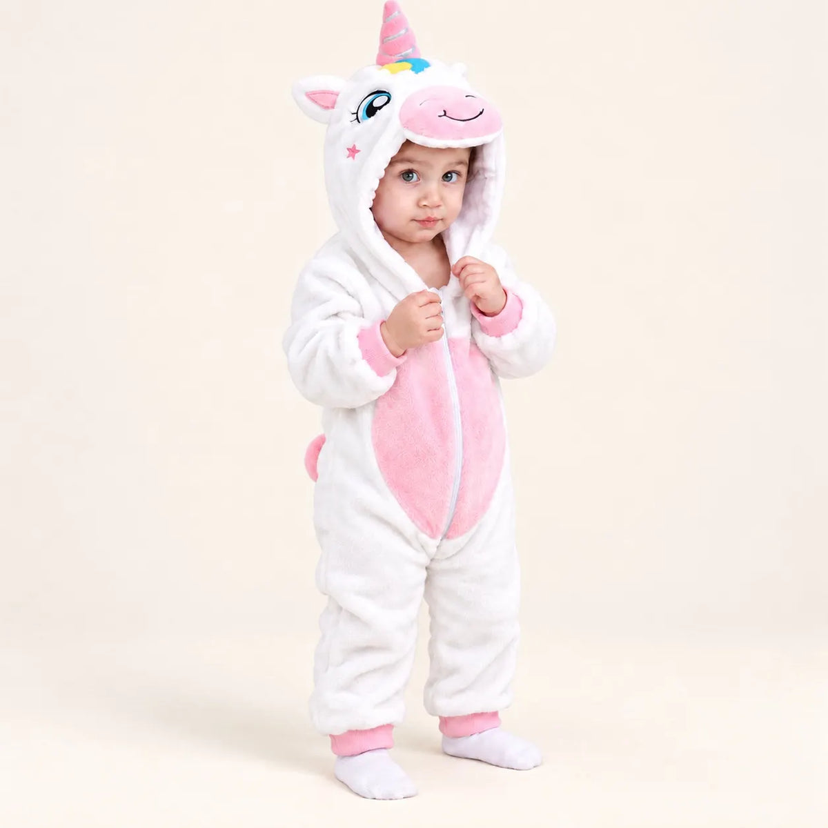 Child wearing Unicorn Soft Fleece Hooded Winter Romper with pink horn, embroidered unicorn face, front zipper and full-length sleeves
