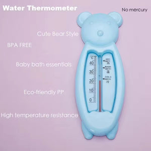 Blue bear-shaped baby bath water thermometer with temperature scale