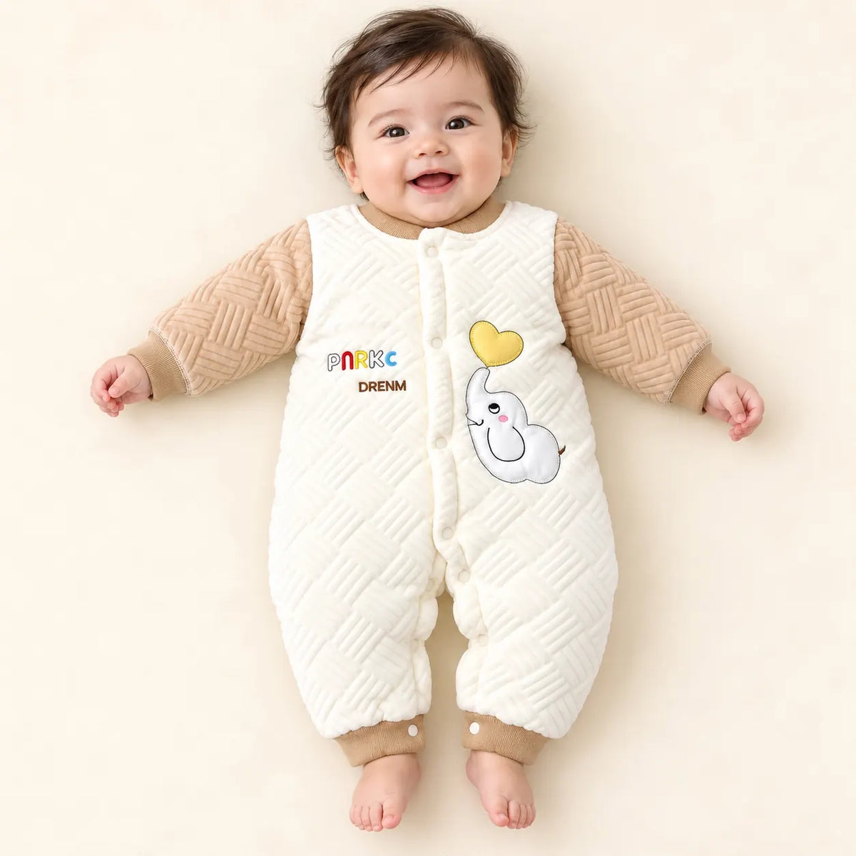 1. Baby Wearing Beige and White Quilted Winter Romper with Elephant Design