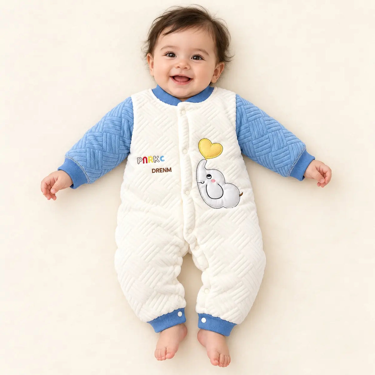 Baby Wearing Blue and White Quilted Winter Romper with Elephant Design