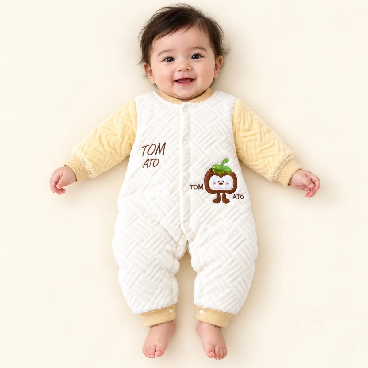Baby Wearing Yellow and White Quilted Winter Romper with Character Design