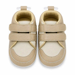 Front view of baby boys beige and cream soft sole double strap shoes