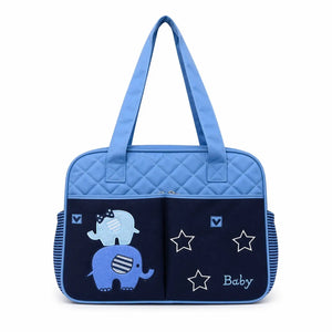 Blue baby diaper bag with elephant print and matching changing sheet