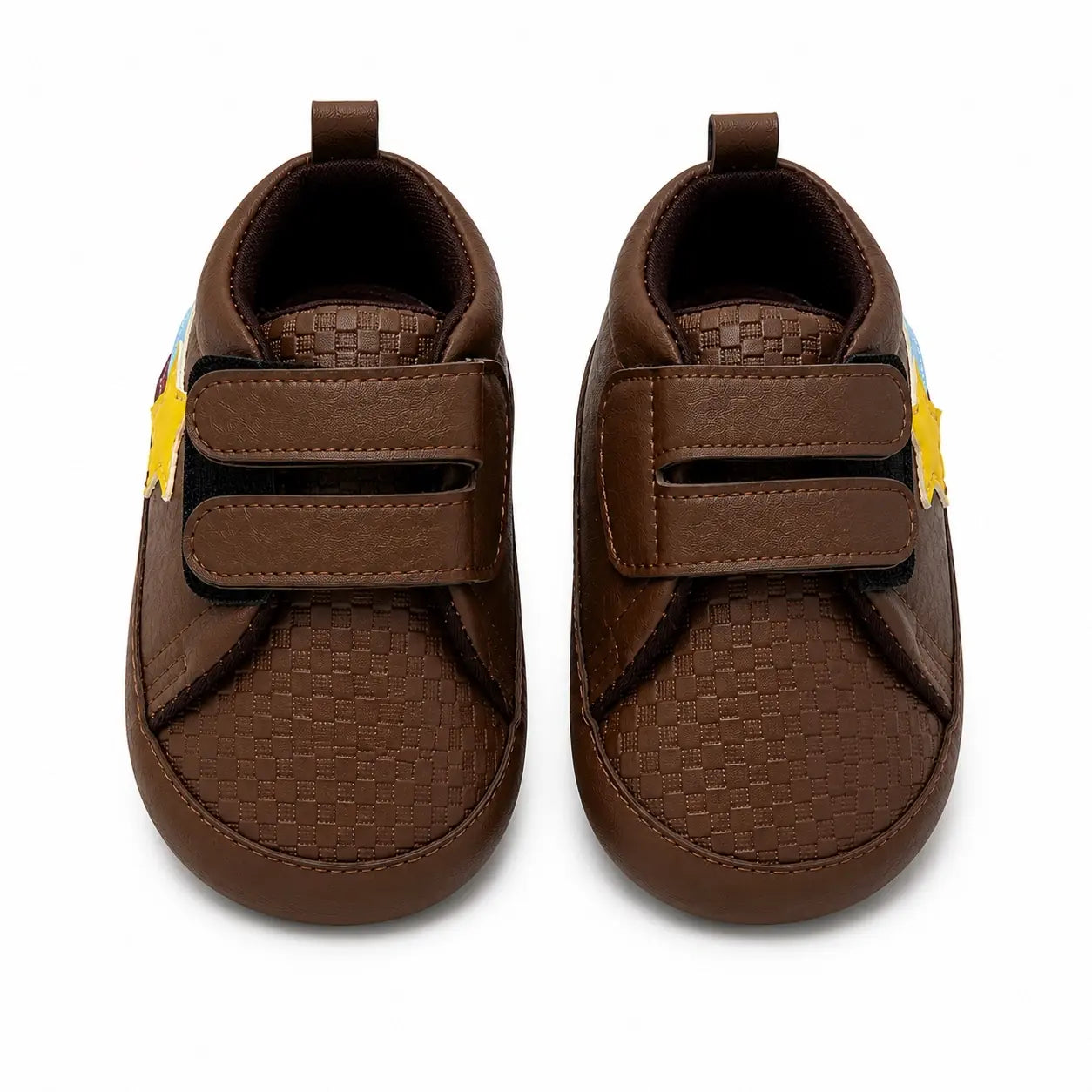 Front view of baby boys brown soft sole double strap shoes with star detail