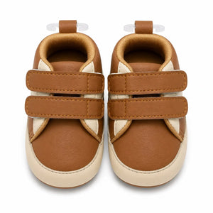 Front view of baby boys brown and cream soft sole double strap shoes