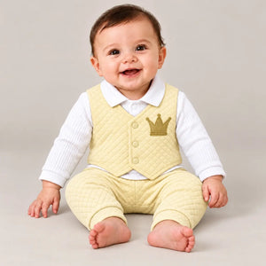 Baby wearing yellow quilted attached waistcoat shirt with golden crown embroidery and matching yellow pajama