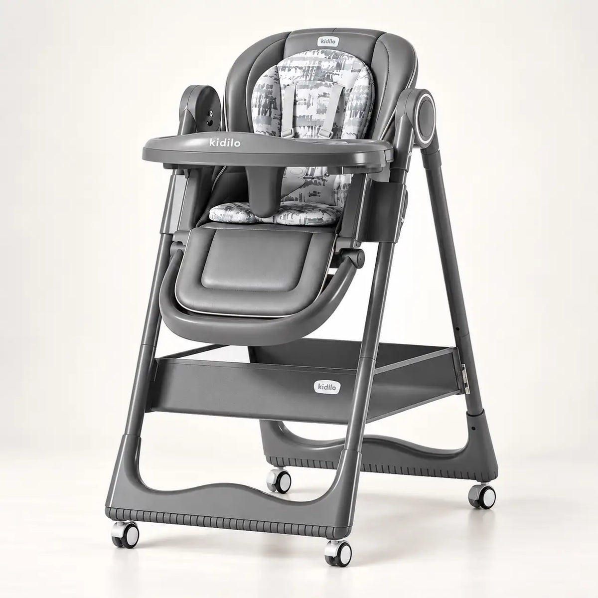 Grey Kidilo KD505 baby feeding high chair with cushioned seat, tray and wheels.