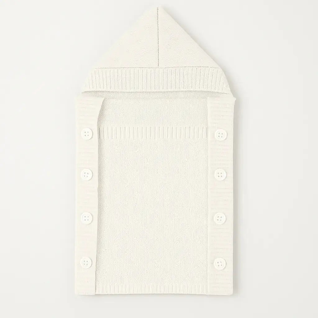 White knitted woolen baby carry nest with button closure for winter