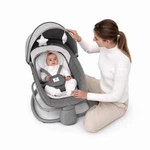 Mastela 4-in-1 electric baby swing in use with baby seated securely