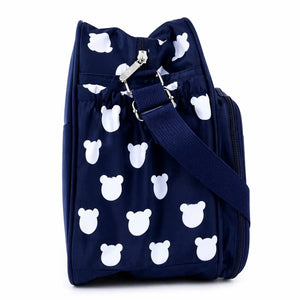 Navy blue teddy baby diaper bag showing cute baby print design
