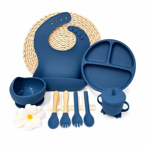 Blue 8-piece silicone baby feeding set with sippy cup, bib and suction plate