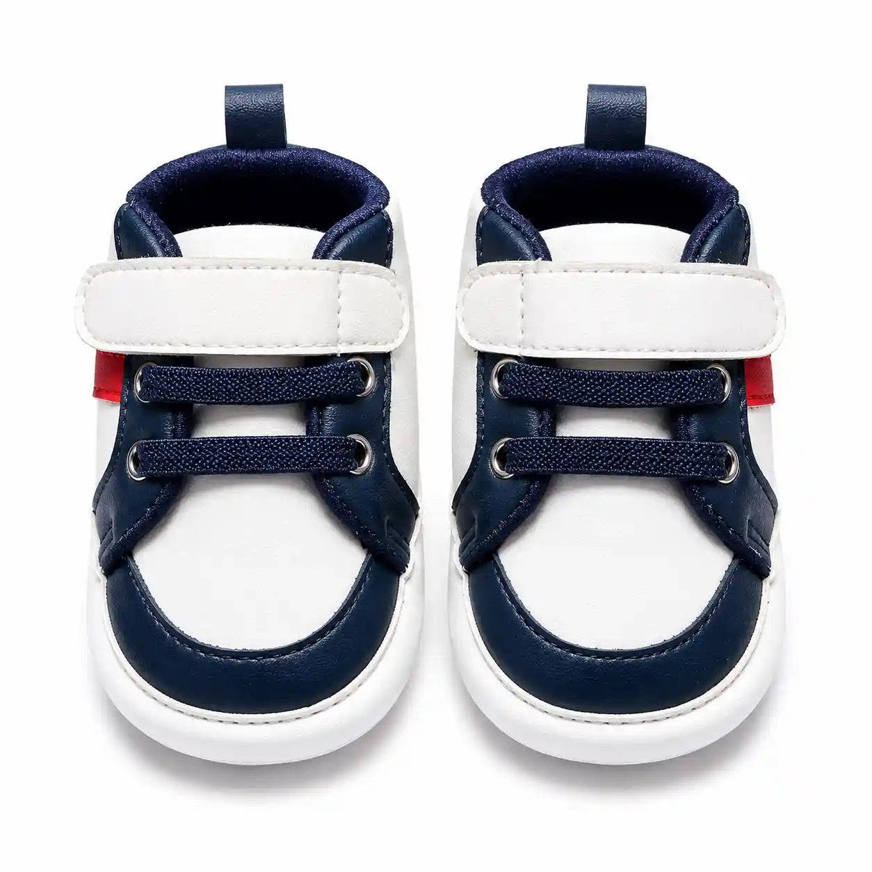 White and navy blue strap baby shoes with lace detailing front view