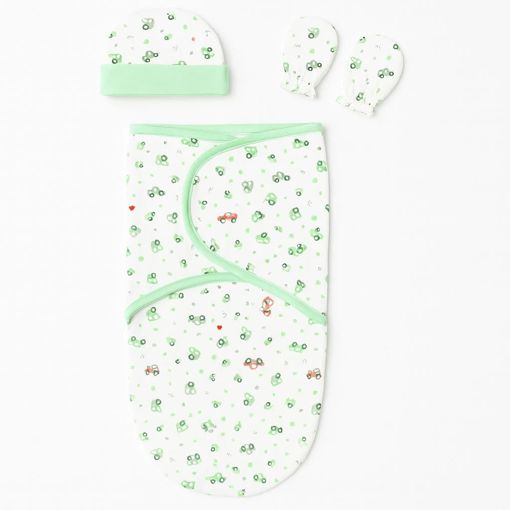 Green printed interlock cotton baby swaddle with matching cap and mittens