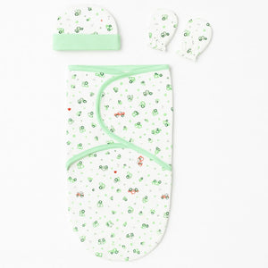 Green printed interlock cotton baby swaddle with matching cap and mittens