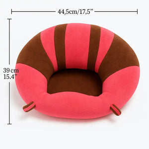 Pink plush baby support seat showing product size details