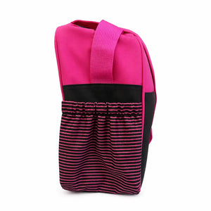 Folded pink baby diaper bag showing compact travel-friendly design