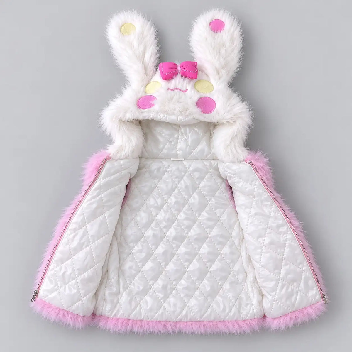 Girls pink bunny hooded fur vest opened to show white diamond-quilted inner lining and zipper closure