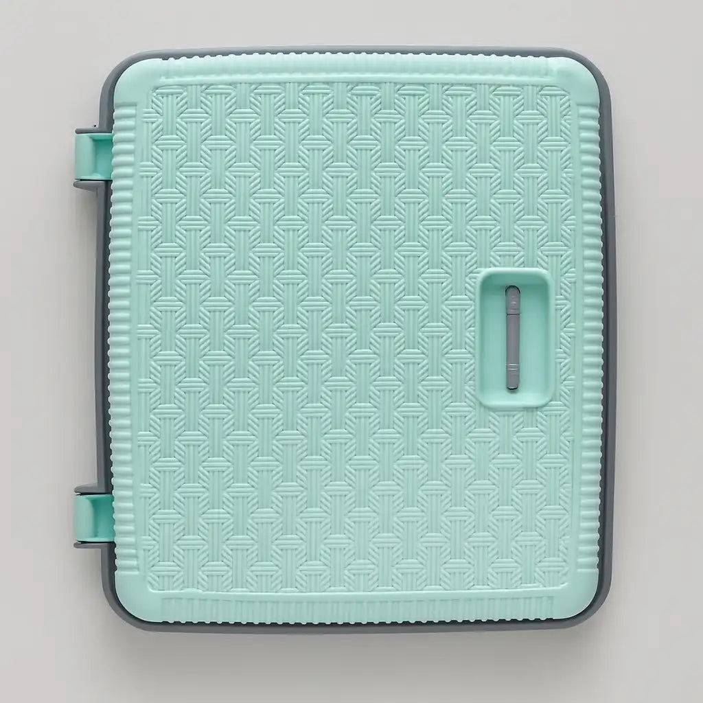 Mint green plastic laundry basket side view with carry handle