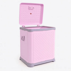 Pink plastic laundry basket with lid open for easy clothes storage