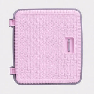 Pink woven plastic laundry basket side view with handle