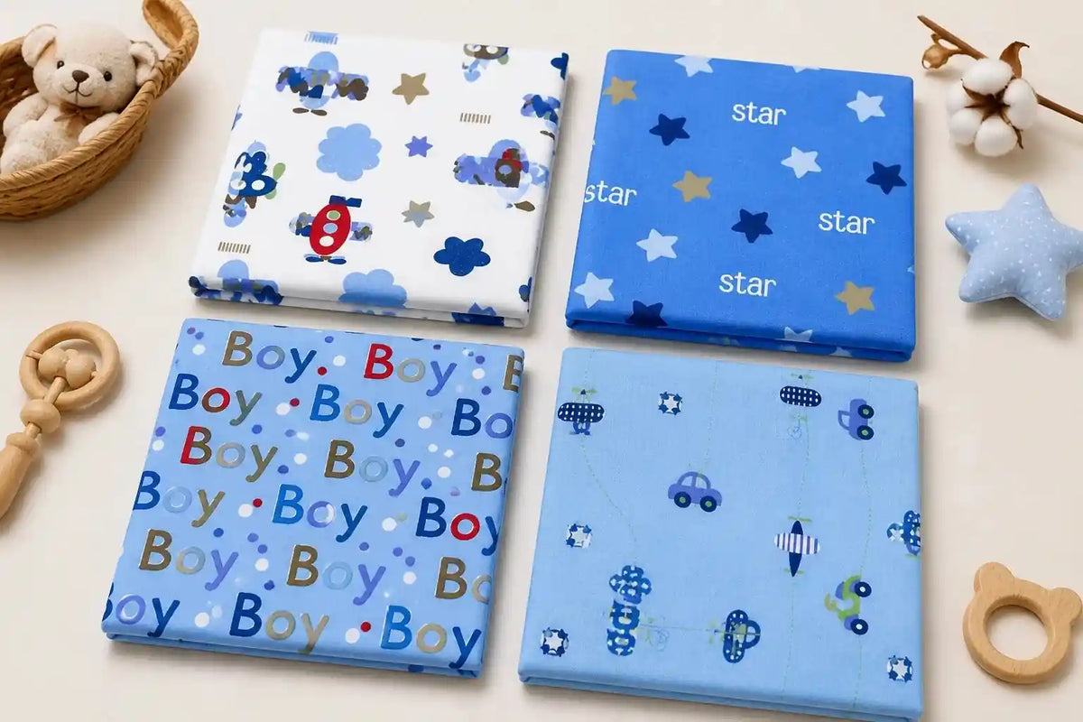 Pack of 4 blue printed premium cotton baby sheets flat lay