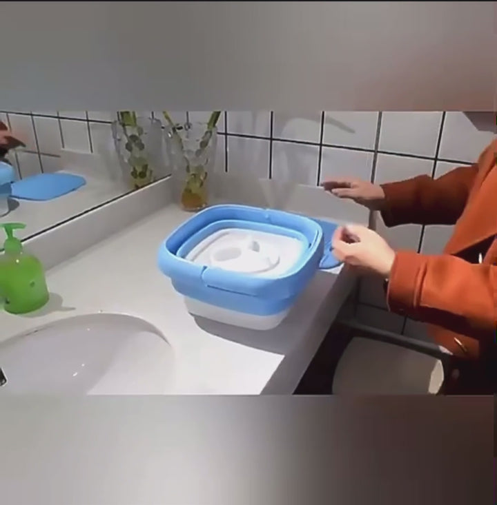Buy folding washing machine online in Pakistan at BabifyStore.pk – portable mini washer for baby clothes, undergarments, socks, and small laundry loads. Space-saving collapsible washing machine for home and travel.