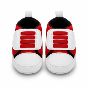Front view of red and white baby soft sole Velcro prewalker shoes