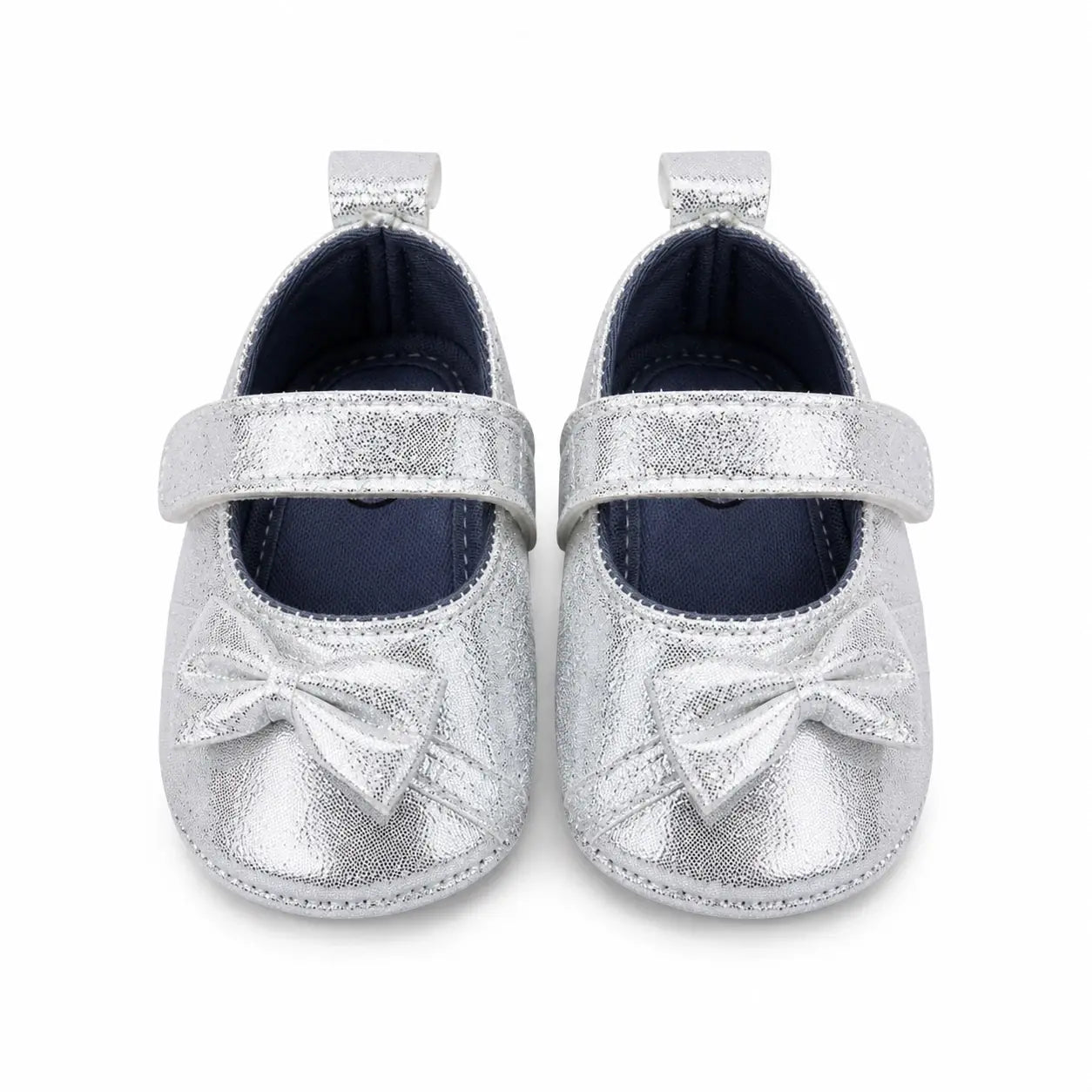 Front view of baby girls silver bow soft sole prewalker shoes