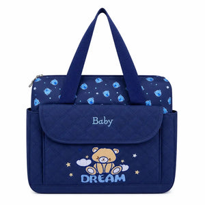Dark blue baby diaper bag with teddy print and multiple storage pockets