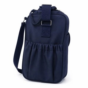 Navy blue baby diaper bag back view with shoulder strap