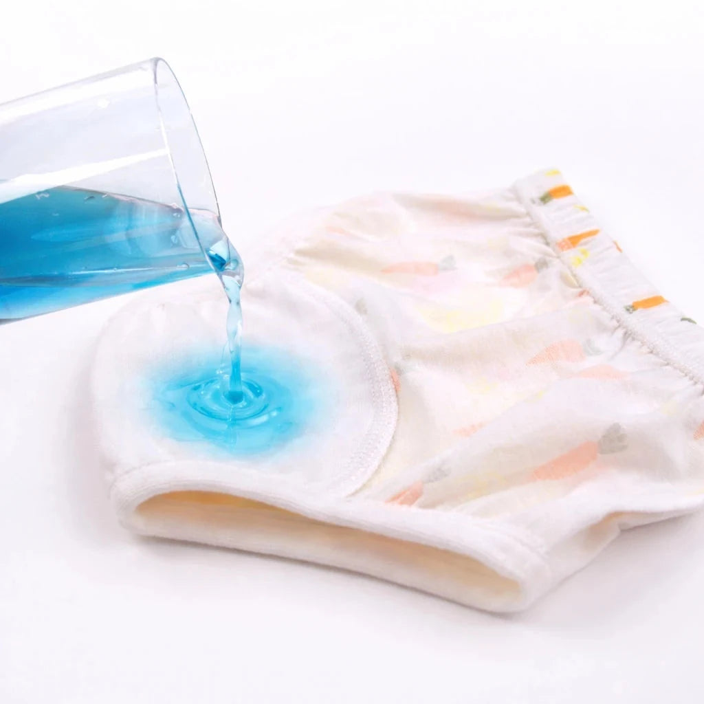 Waterproof reusable baby training pants absorbency test with water