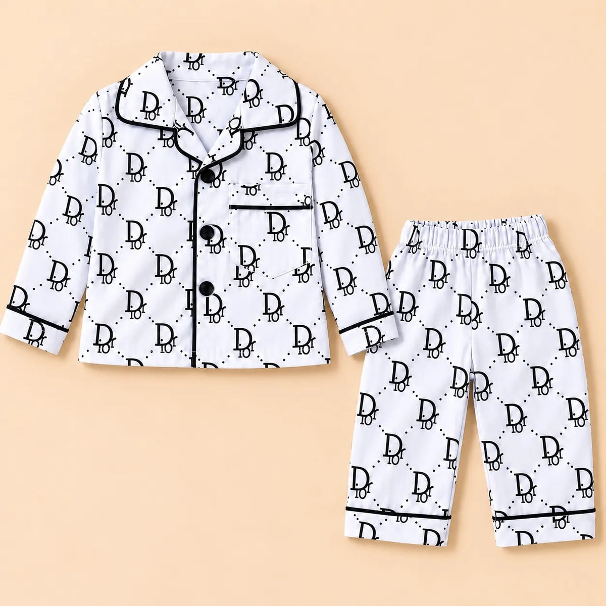 Black-and-white monogram print baby night suit with a collared button-front shirt and matching elastic-waist pajamas