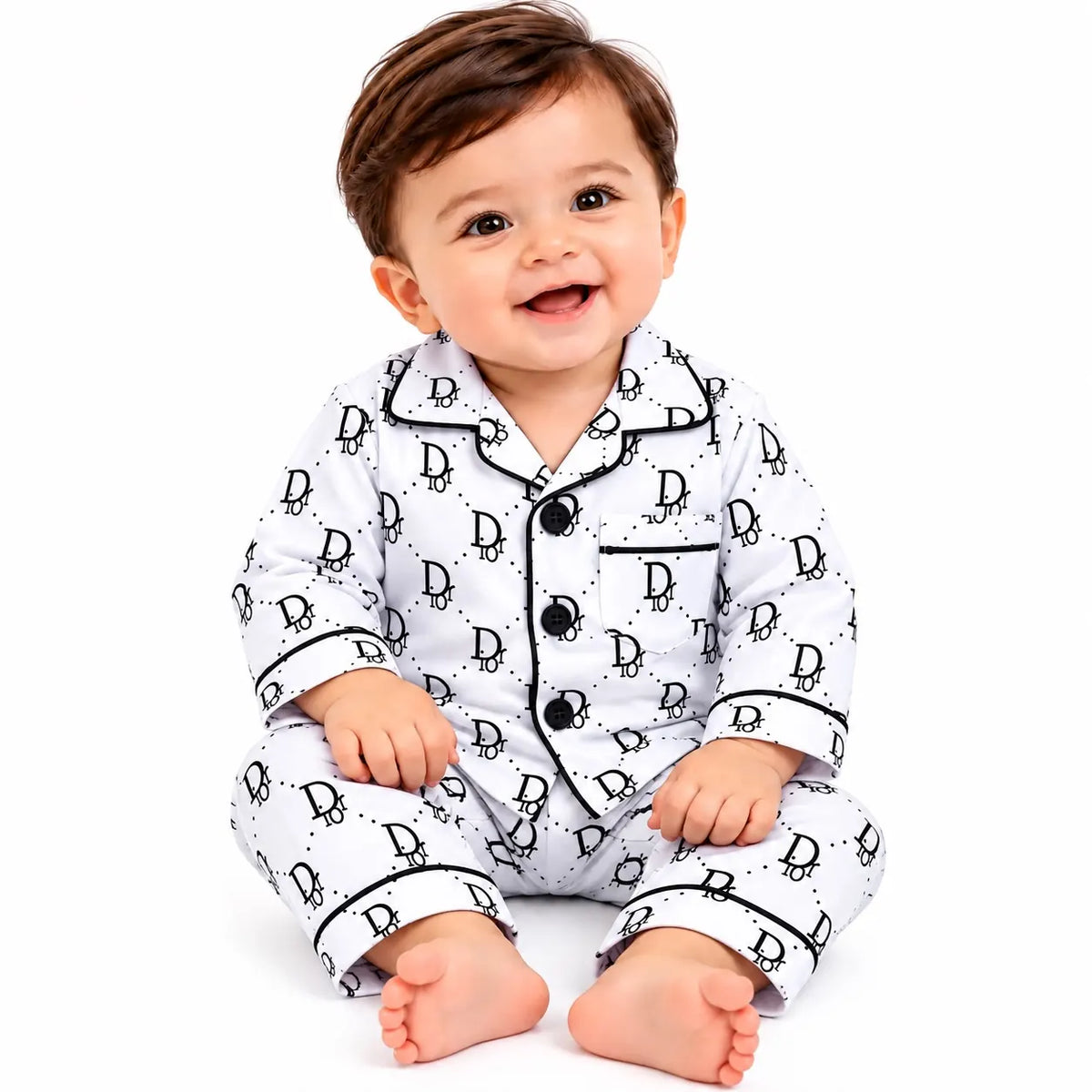 Black-and-white monogram print baby night suit with a collared button-front shirt and matching elastic-waist pajamas